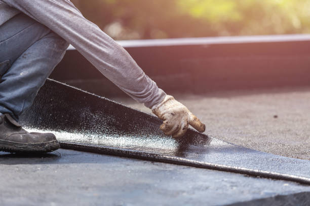 Professional Waterproofing technician working in Hooven, OH
